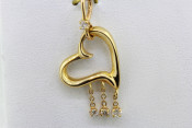 14k heart pendant with dangling diamonds