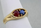 14k star ruby and star sapphire ring