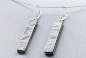 18k white gold African symbolism earrings