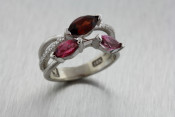 14k white gold bypass ring with rubies and diamonds 