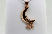18k rose gold moon and star pendant with diamonds