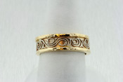 14k two toned band with swirl design