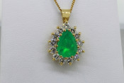 14k Pear cut emerald with diamond halo pendant