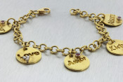 18k Multilingual love charm bracelet