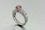 platinum engagement ring with pink and white diamonds