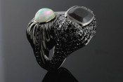 18k black gold opal and garnet ring with tooth